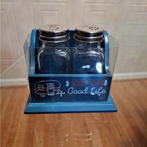 Brand New Sal & peppers shakers with a wood holder. “Living The Good Life”